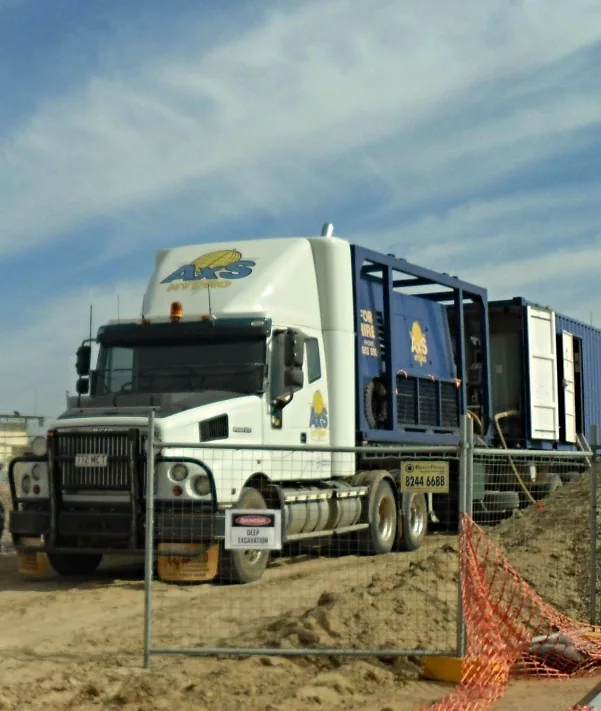 Mobile test laboratory on a fenced work site